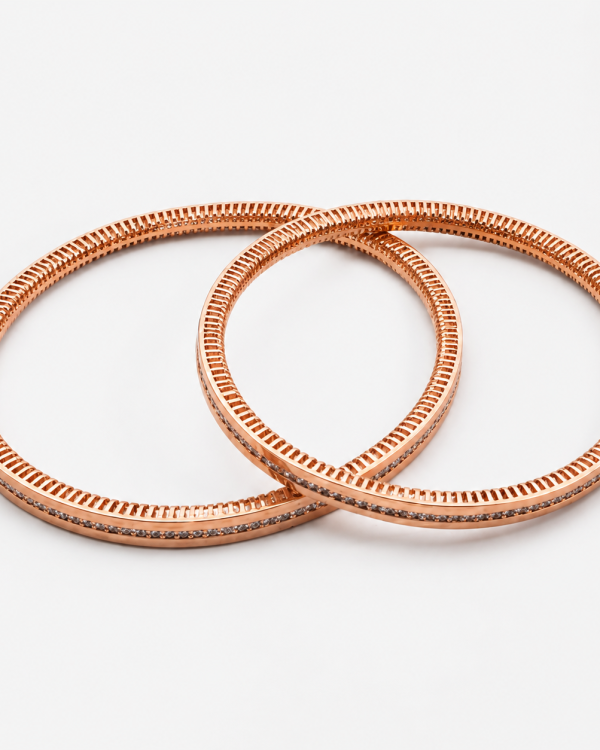 JAINIKA Celeste Radiance Rose Gold Bangles — styled view