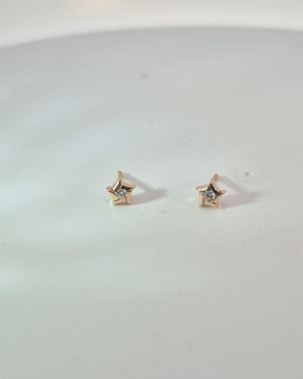Celeste Crystal Rose Gold Stud Earrings — styled view