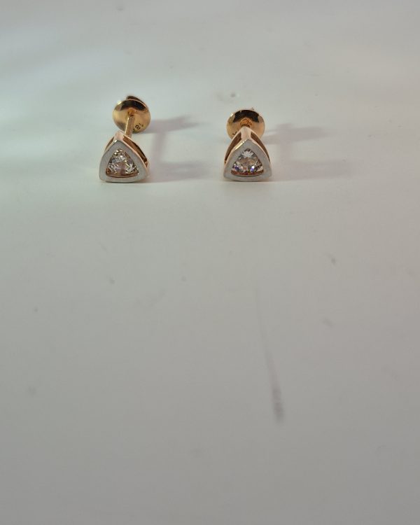 JAINIKA Celeste Trillion Crystal Stud Earrings — styled view